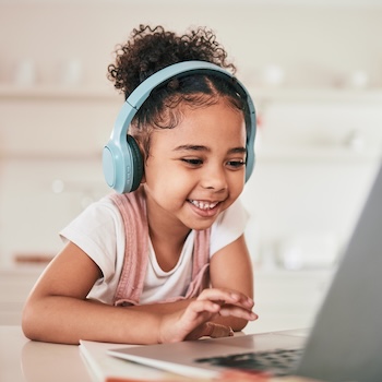 A child using a computer for homeschooling