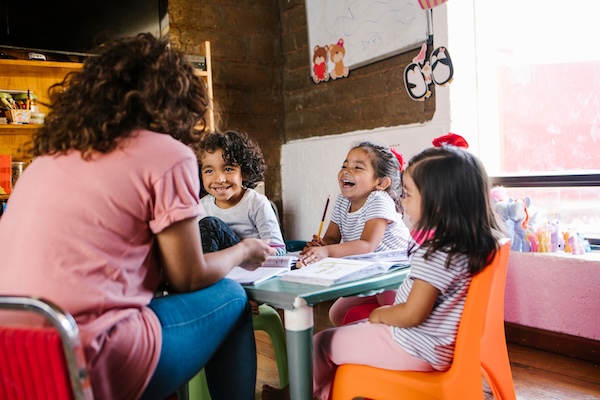Kids Sitting Around Table